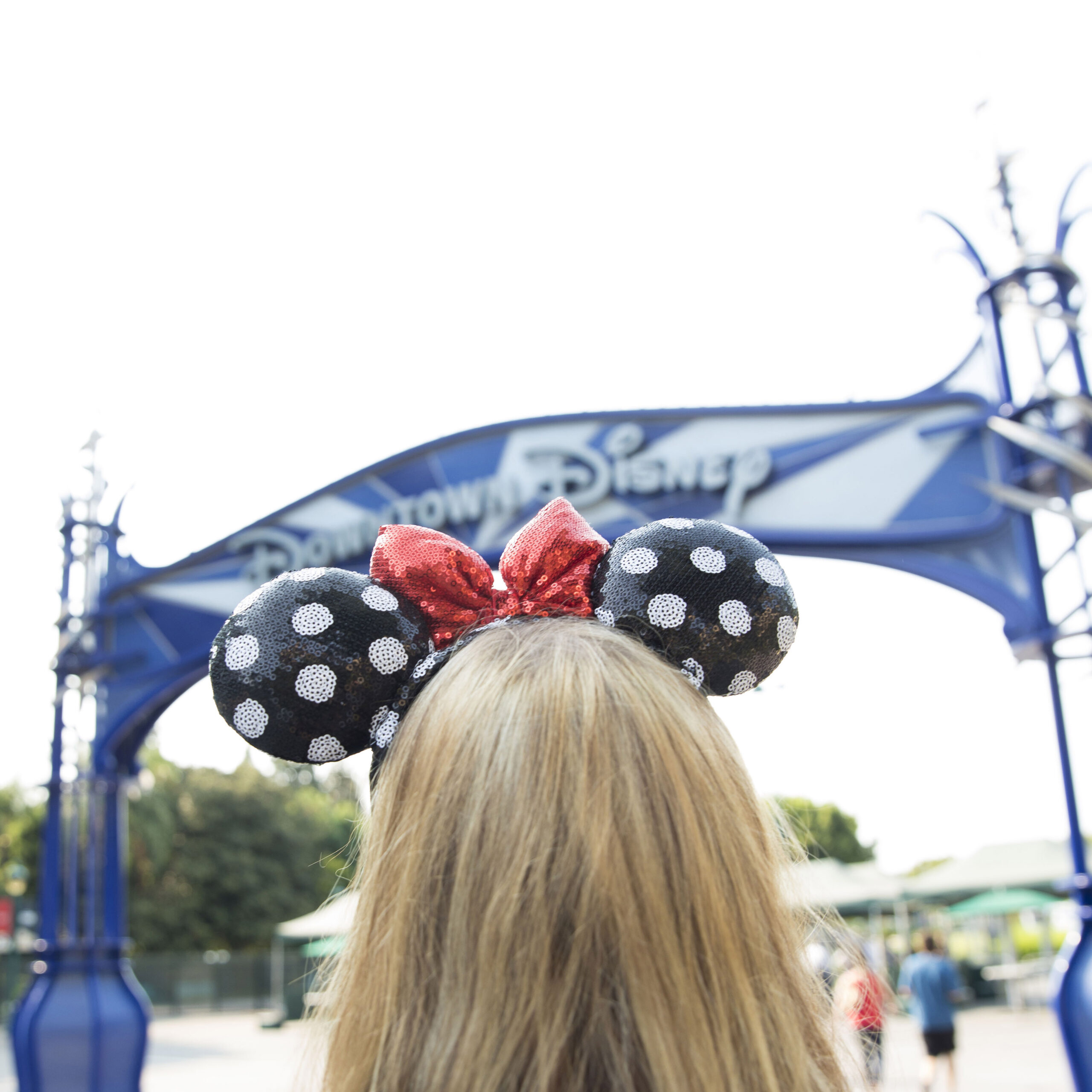Girl in Mickey Ears outside Downtown Disney